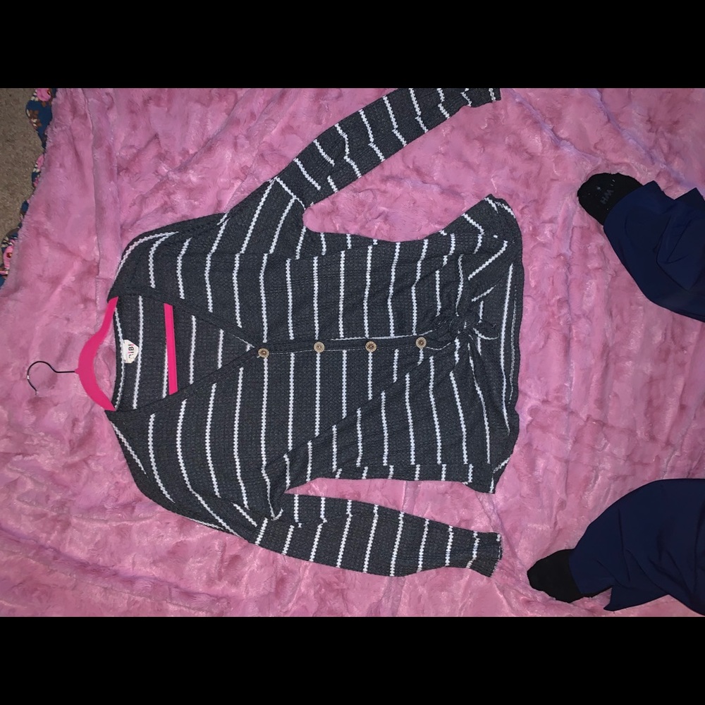 Grey and white stripe top. Ties at waist